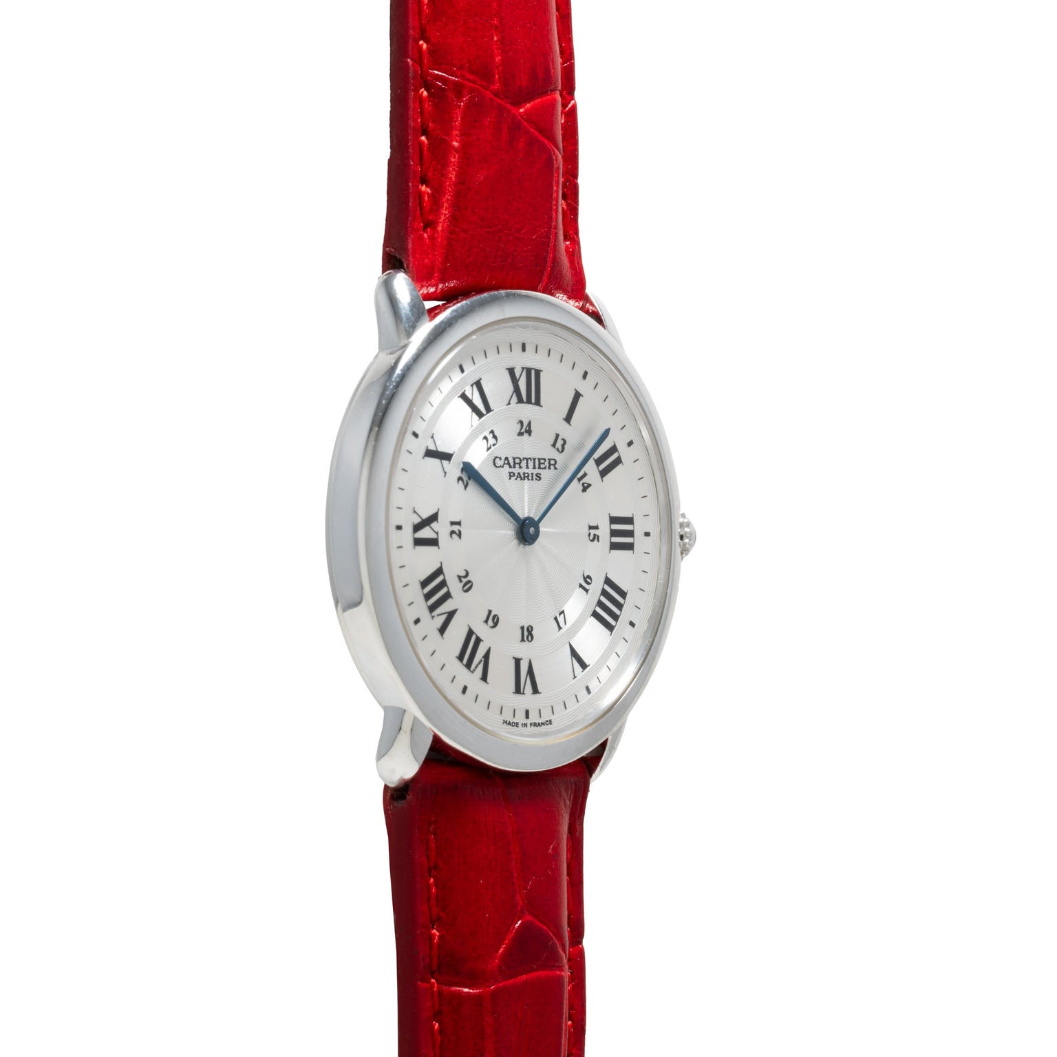 The Cartier Ronde Louis CPCP is a silver round watch with Roman numerals and a red leather strap, displayed on a white background.