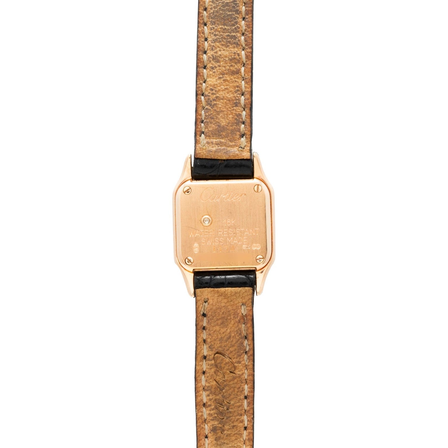 Back view of the Cartier Panthère wristwatch featuring a brown leather strap and engraved details on its gold case.