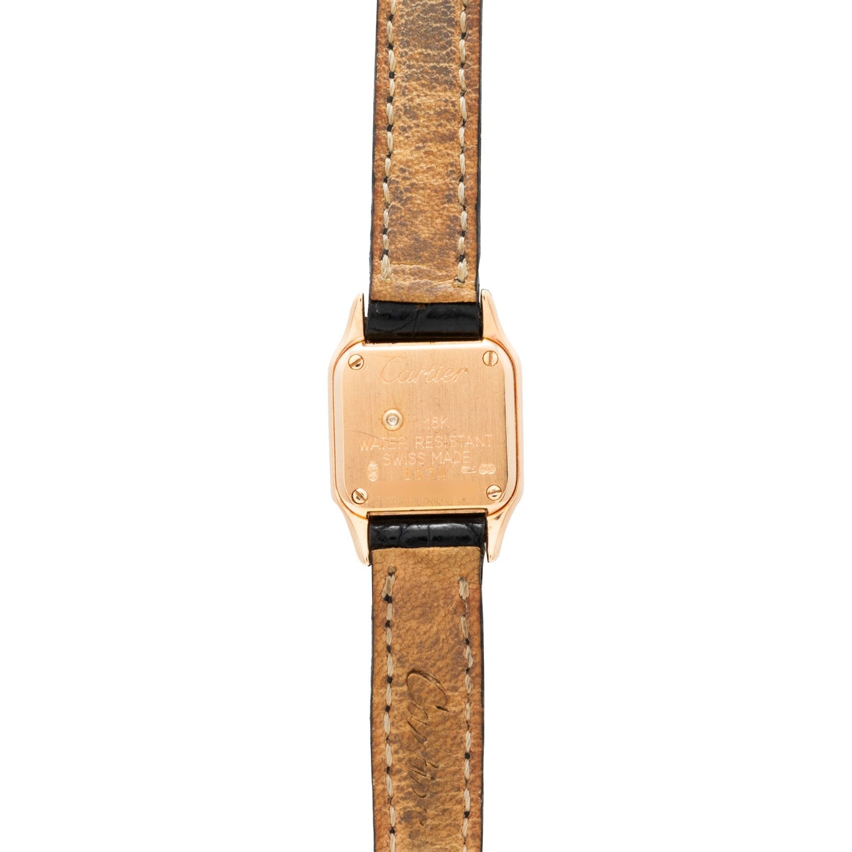 Back view of the Cartier Panthère wristwatch featuring a brown leather strap and engraved details on its gold case.