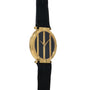 The Piaget Polo Onyx is a gold watch with a black face, vertical gold bars, and a black leather strap, shown on a white background.