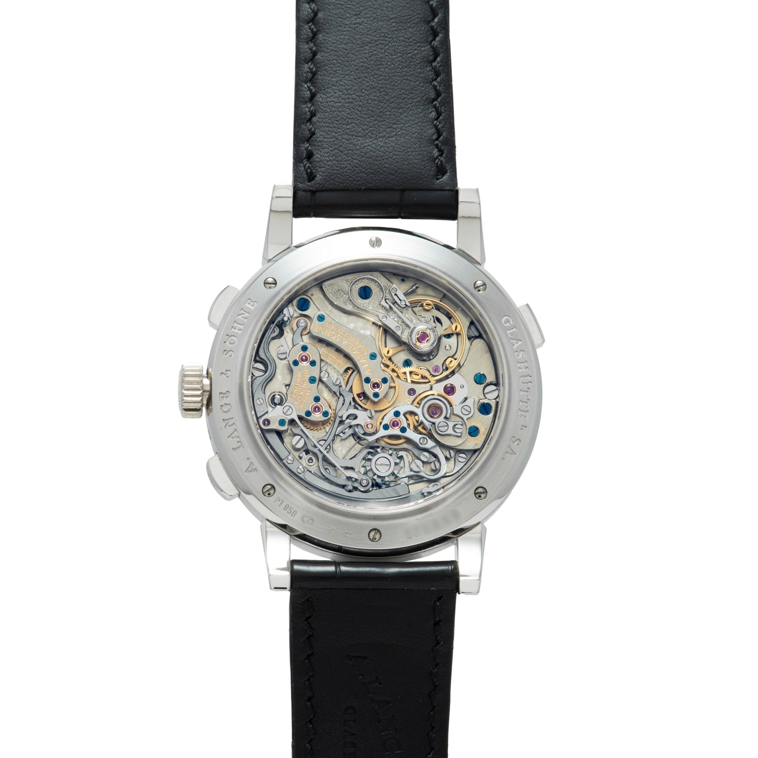 The Lange & Sohne Datograph Perpetual Calendar is a luxury watch featuring a transparent case back that reveals its intricate mechanical movement, paired with a black leather strap.