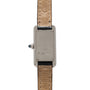 The Cartier Tank Ladies Allongee features a tan leather strap and engraved details on its silver rectangular case.