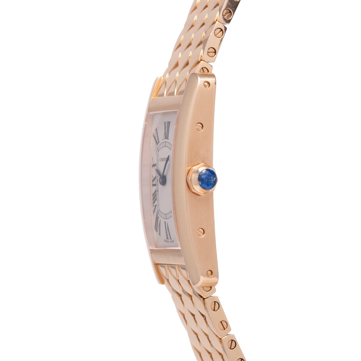 A close-up side view of the Cartier Tank Americaine by Cartier, a ladies’ 18K rose gold watch featuring a silver guilloché dial with Roman numerals, blue gemstone crown, and gold link bracelet.