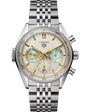 Silver stainless steel chronograph watch with cream dial, gold-tone indices, and multicolored subdials on metal bracelet.