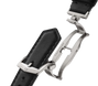 Silver-tone watch band clasp with black leather strap and deployment buckle mechanism.