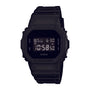 Black Casio G-Shock digital watch with square resin case and band, displaying time and date on LCD screen.