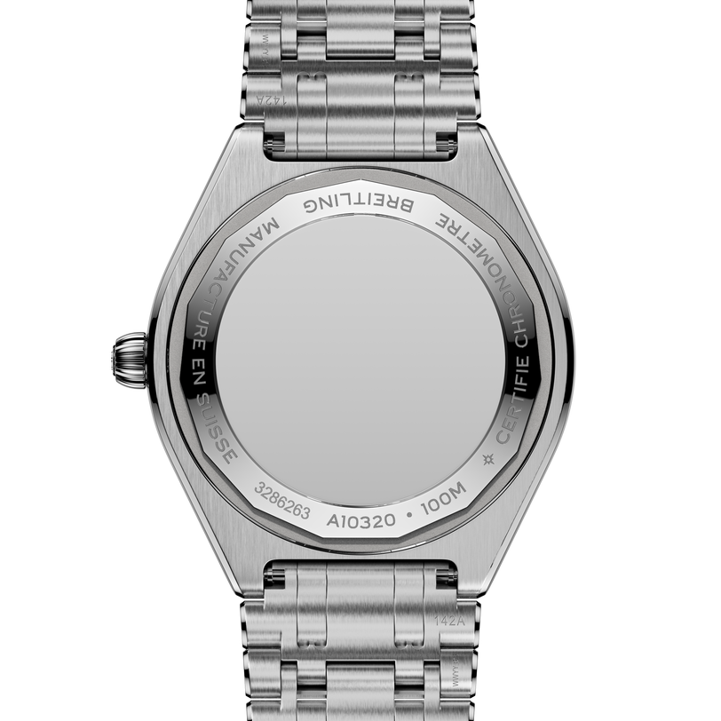 Stainless steel watch with linked bracelet, visible case back showing engraved text and 100M water resistance rating.