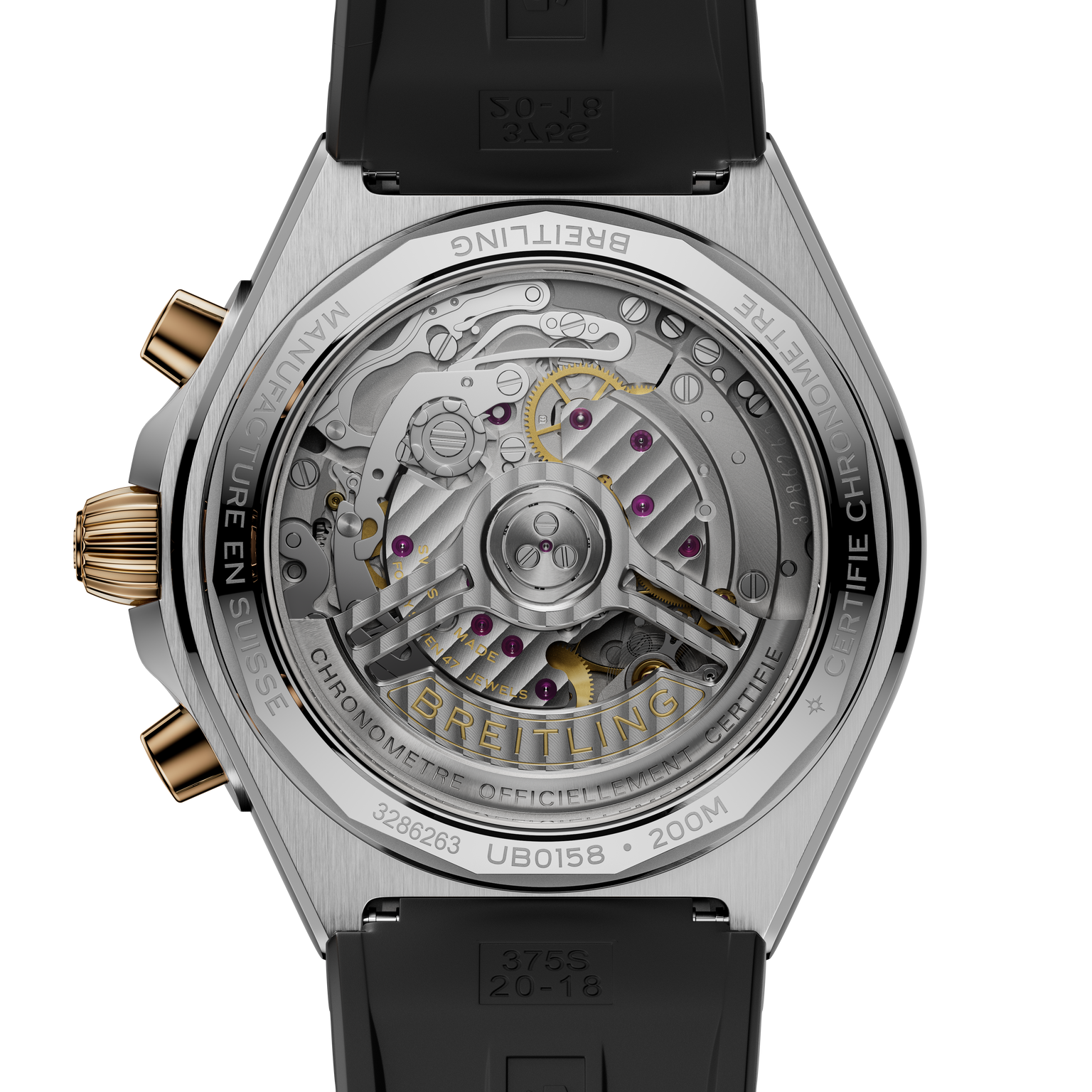 Stainless steel watch with exposed mechanical movement, gold-tone chronograph pushers, and black rubber strap.