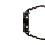 Black digital watch with resin band and case, shown from the side profile.