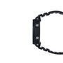 Black digital watch with square resin case and textured rubber strap, shown from the side.