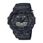Black G-Shock watch with analog hands, digital display, resin band, and shock-resistant case.