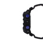 Black resin digital watch with blue textured buttons and black rubber strap, shown from side profile.
