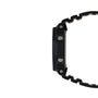 Black resin digital watch with solar icon, side view showing rectangular case and textured band.