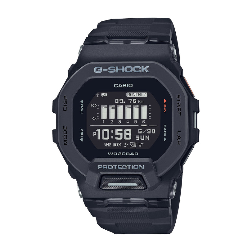 Black G-Shock digital watch with square face, resin band, and LCD display showing time and activity data.