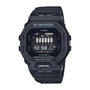 Black G-Shock digital watch with square face, resin band, and LCD display showing time and activity data.