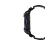 Black digital watch with textured resin case and rubber band shown from the side angle.