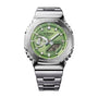 Silver stainless steel G-Shock watch with green dial, analog and digital display, and metal bracelet.