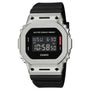Casio G-Shock digital watch with silver textured stainless steel case, black resin band, and rectangular black dial displayin