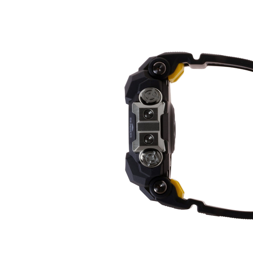 Black resin digital watch with yellow accents, multiple dials, and black band shown from the side.