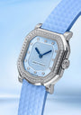 Gerald Charles watch with light blue face and strap on a matching background