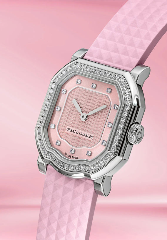 Pink watch with diamond accents on a pink background