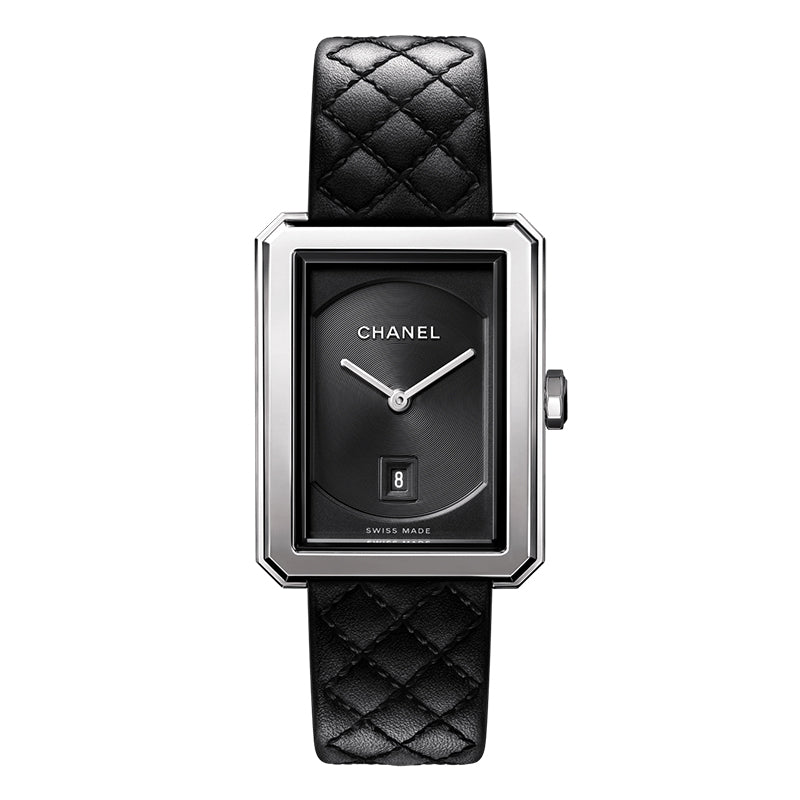 The Chanel Boy·Friend is a medium rectangular steel watch with a black quilted calfskin strap, black dial, silver hands, date display at 6 o’clock, and a sleek silver bezel.