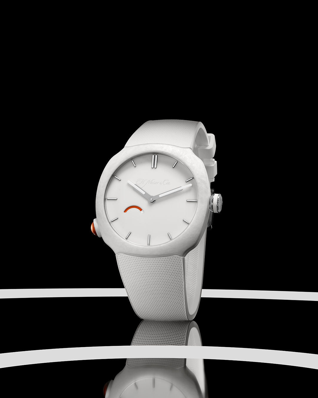 White round watch with white fabric band, silver hour markers, and small red accent on dial.