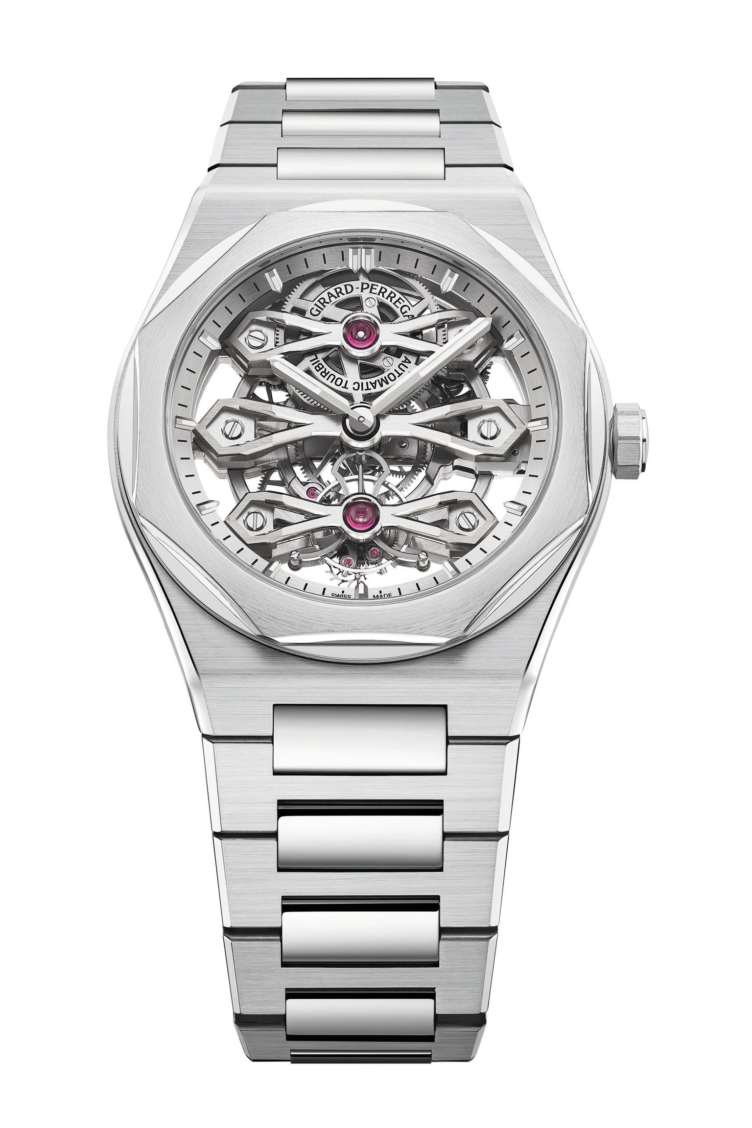 The Girard-Perregaux Laureato Three Gold Bridges is a luxury silver wristwatch featuring a stainless steel bracelet and an openwork skeleton dial that showcases intricate gears, components, and a tourbillon. The brand’s name appears at the top of the dial.