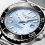 Longines watch with silver case and blue dial on a white background