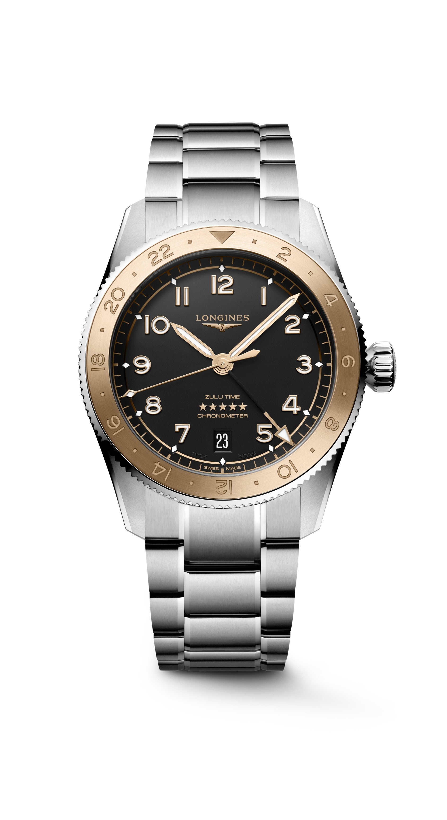 The Longines Spirit Zulu Time is a silver aviation watch with a black dial, gold bezel, bracelet strap, gold Arabic numerals, luminescent hands, date window at 6 o'clock, and "ZULU TIME" above the stars.