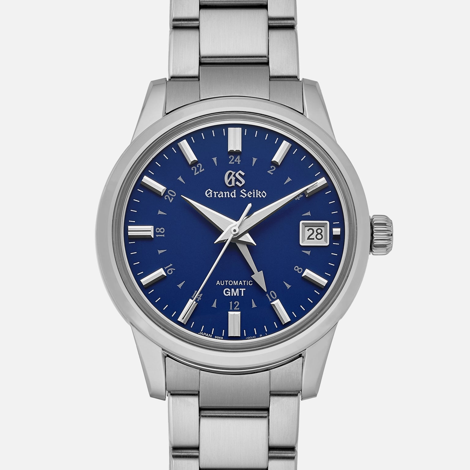 The Grand Seiko Automatic GMT SBGM239 Limited Edition For HODINKEE features a blue dial with silver markers and hands, date at 3 o’clock, GMT function, 24-hour inner ring, stainless steel case and bracelet. Available exclusively on HODINKEE.