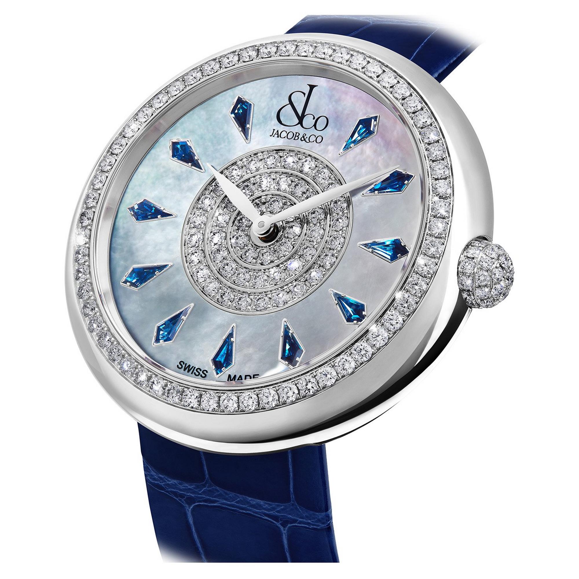 Jacob & Co stainless steel watch with diamond-set bezel, mother-of-pearl dial, blue sapphire hour markers, and navy leather s