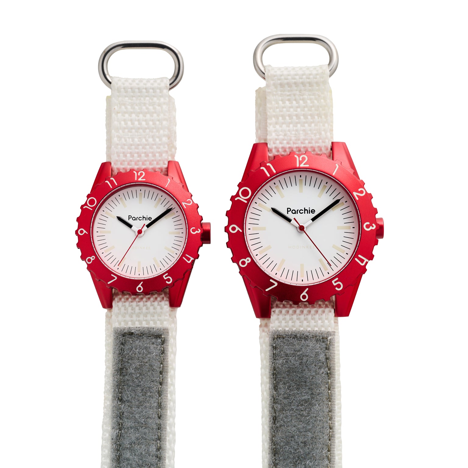 Size comparison of the 32mm Parchie "Lunar-Time" Limited Editions for Hodinkee watch on the left and the 36mm on the right