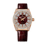 Grand Seiko watch with rose gold case, diamond-set bezel, deep red dial, and burgundy leather strap.