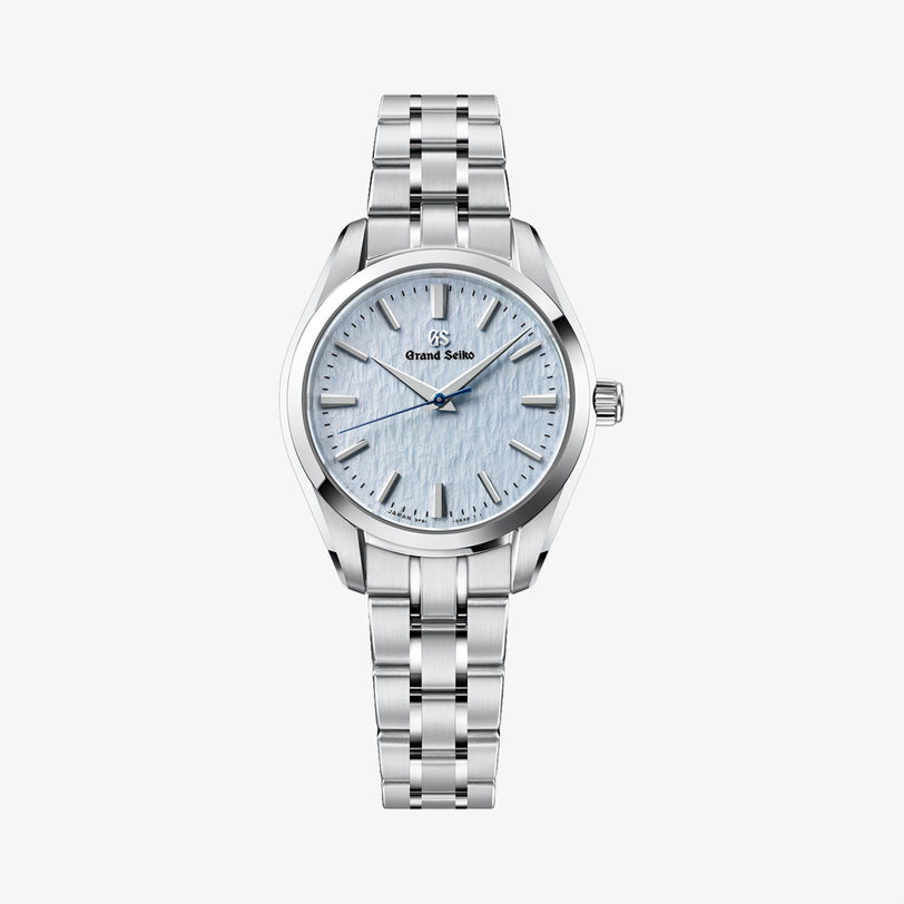 Silver watch with a light blue face on a white background