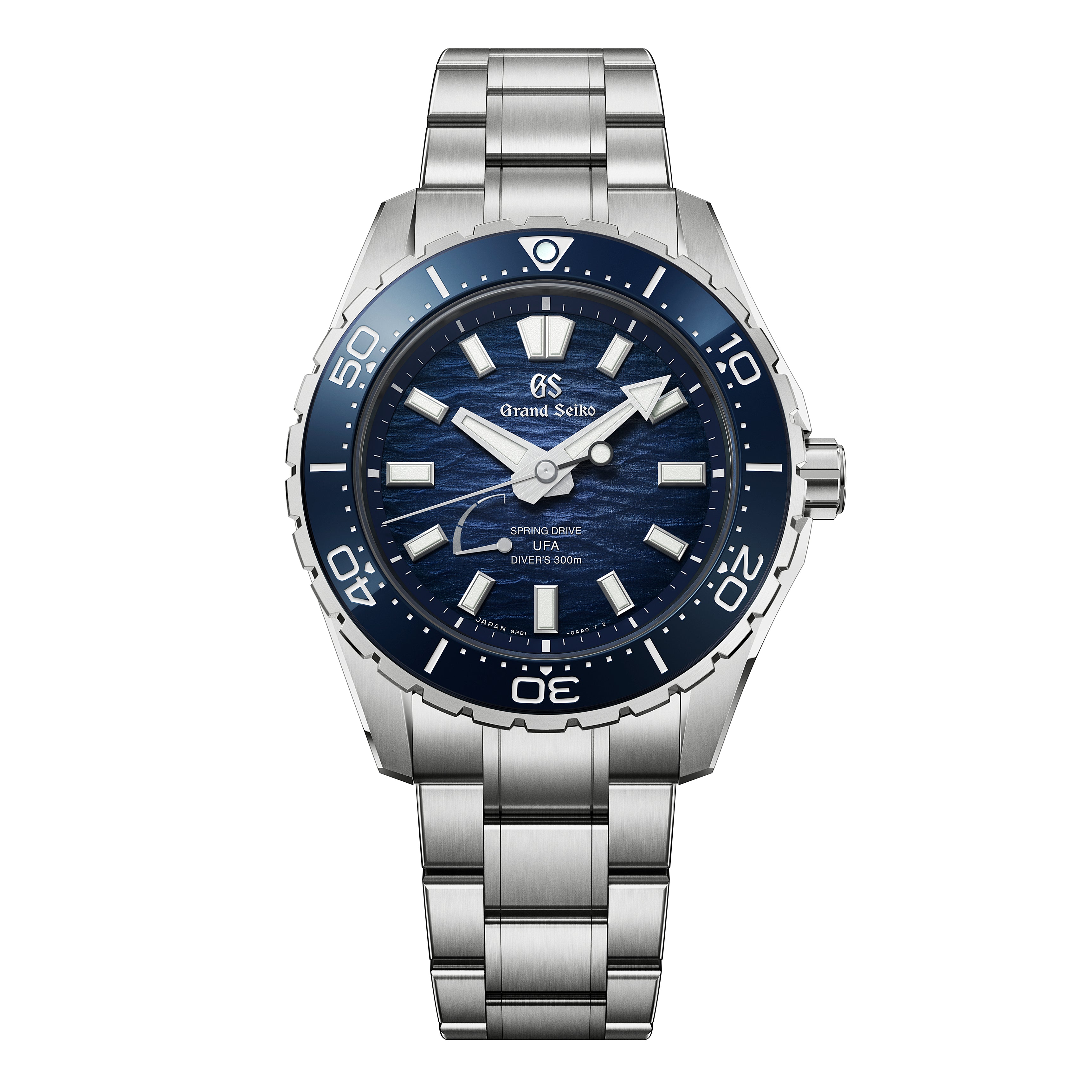 Silver stainless steel dive watch with dark blue dial, white hour markers, and blue rotating bezel.