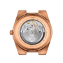 Back view of the Tissot PRX Powermatic 80 40mm, featuring an exposed automatic movement in a rose gold stainless steel case.