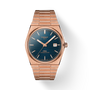 The Tissot PRX Powermatic 80 40mm features a rose gold finish, blue textured dial, date display, and a metal bracelet.