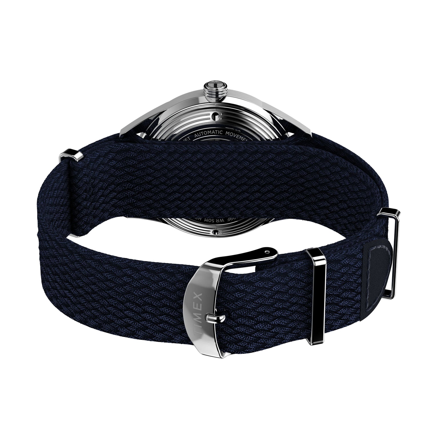 A close-up of the back of the Timex Marlin® Jet Automatic watch shows its retro-futuristic design, featuring a dark blue woven strap, silver buckle, and an exposed case back with the strap facing forward.