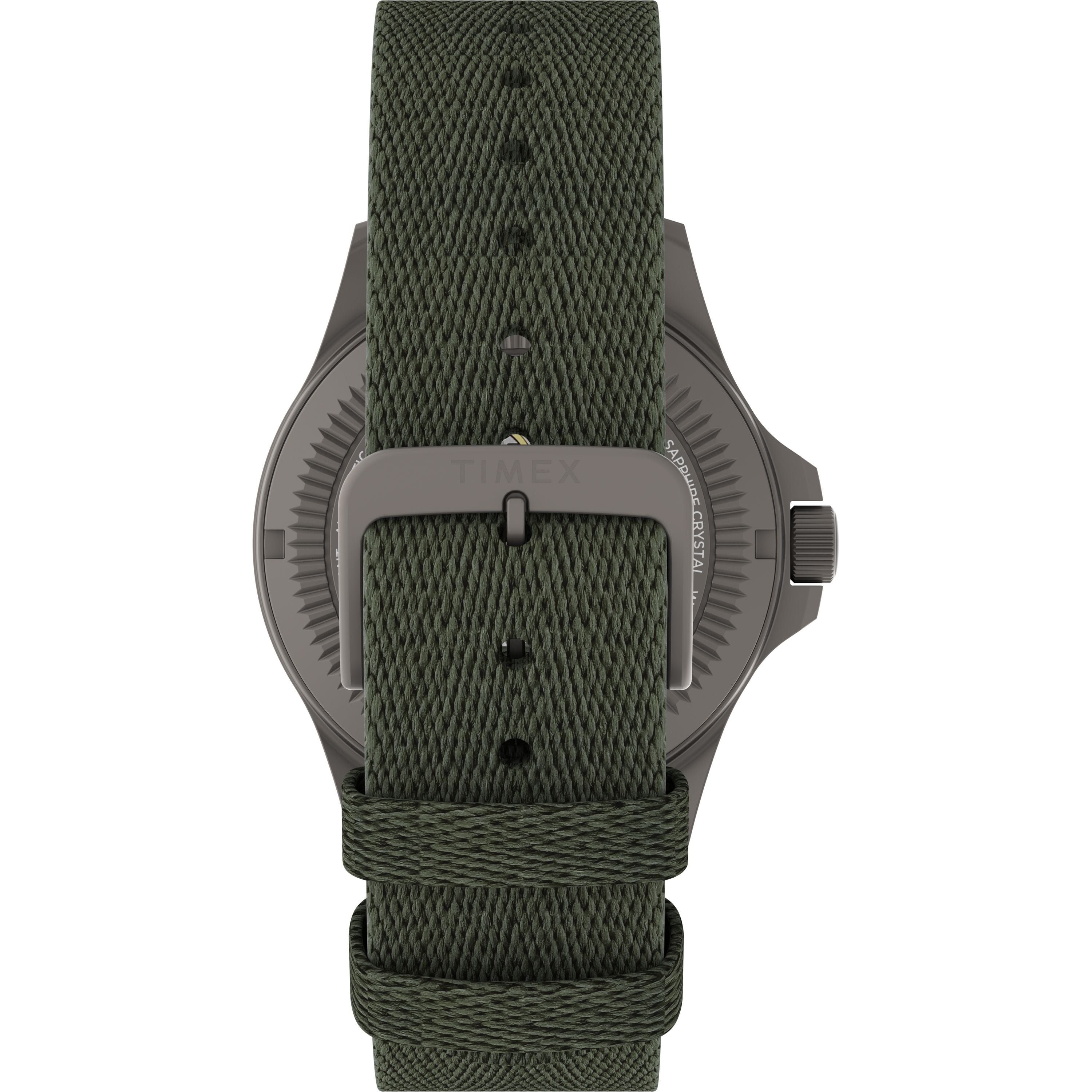 Close-up of the Expedition Titanium Automatic by Timex, featuring a titanium case and a green textured fabric strap with a metal buckle engraved with TIMEX, highlighting the precision craftsmanship of this collection.