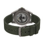 The Timex Expedition Titanium Automatic, featuring a green fabric strap and silver buckle, is shown from the back with its transparent case back revealing the Japanese automatic movement inside.