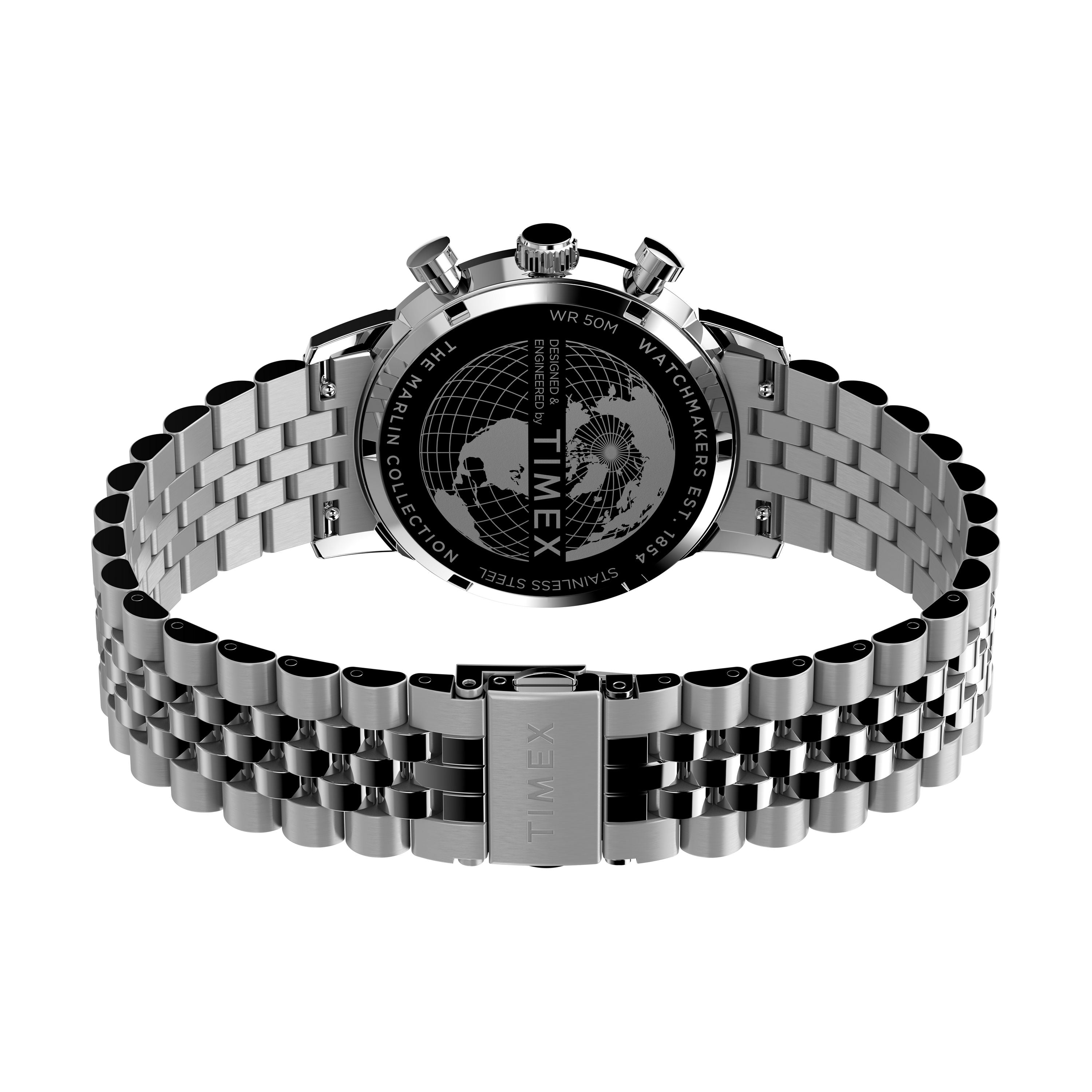 A Timex Marlin® Chronograph Tachymeter is shown from the back, revealing its engraved globe caseback with branding. The stainless steel link bracelet and clasp with the Timex logo are also visible.