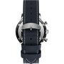 A close-up of the Marlin® Chronograph Tachymeter by Timex shows its stainless steel case back and dark blue leather strap with light stitching and a metal buckle engraved with TIMEX.