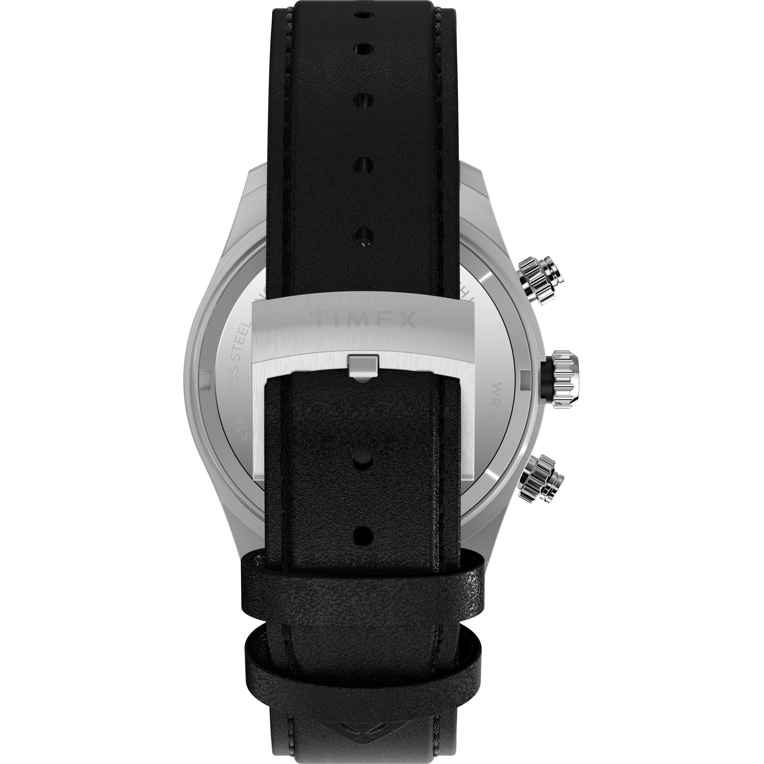 Close-up of the Timex Waterbury Heritage Chronograph’s stainless steel case, showing two buttons, a crown, and its chronograph design, plus a black leather strap with silver buckle.
