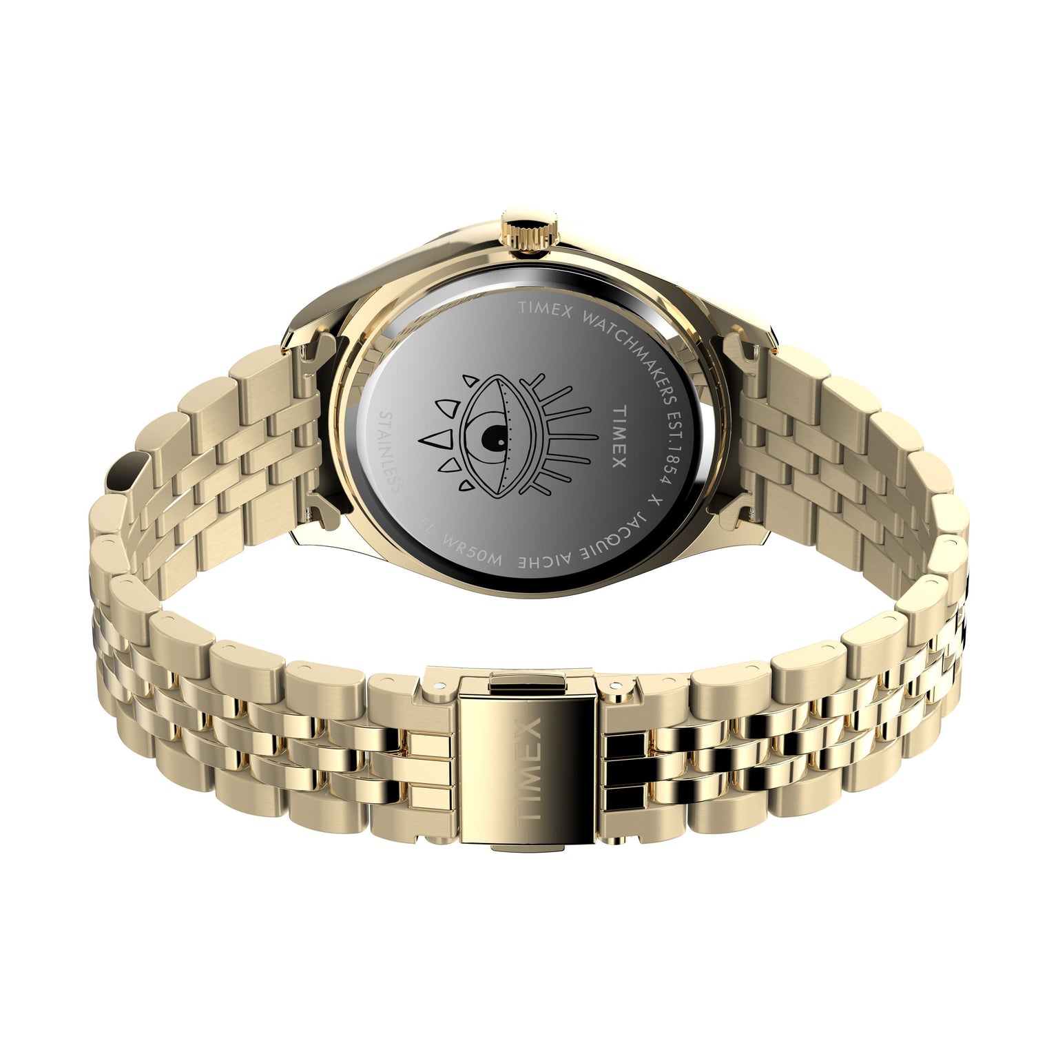 A gold-tone Timex x Jacquie Aiche stainless-steel watch with metal link band, engraved eye and “Timex Watchmakers Est. 1854,” part of the Timex x Jacquie Aiche collection, shown from the back.
