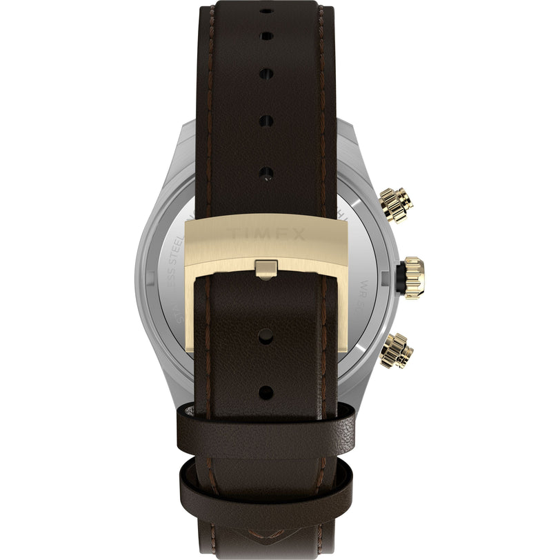 A close-up of the Timex G SS QZ WTRBY HERT 39 BLK DL LTHR STP 25 showcases its detailed dial and tachymeter bezel.