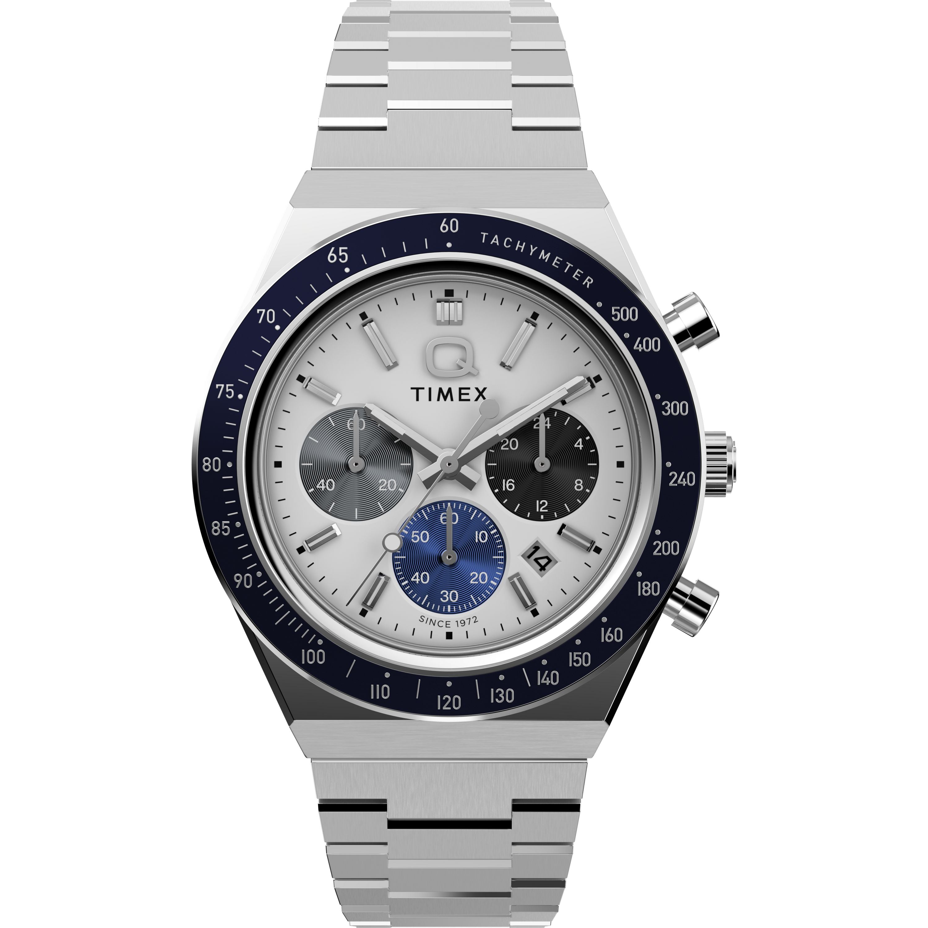 The Timex Q Chronograph features a silver case, blue and white dial, three subdials, date window, two side buttons, and a stainless steel bracelet, shown against a white background.