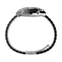 Side view of the Timex Q Chronograph shows its silver stainless steel bracelet, case, crown, and two pushers. The open clasp and band form a partial circle around the watch.