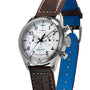 The Timex G SS QZ SW WATERBURY TRAD 41 WHITE DL 25 features a stainless-steel case, white dial with black numerals, chronograph, brown leather strap with blue underside and embossed airplane, plus Pan Am logo and text on the face.