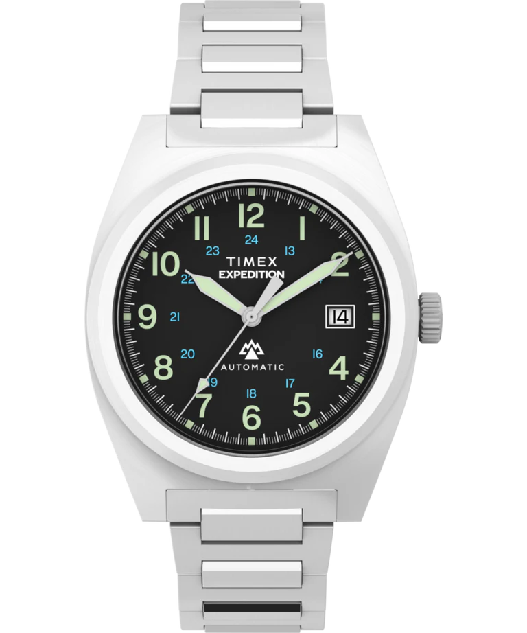 The Timex Expedition® Capstone Automatic features a Japanese automatic movement, silver stainless-steel band, black dial, luminous Arabic numerals, white hour and minute hands, blue second hand, date at 3 o'clock, and AUTOMATIC above 6.